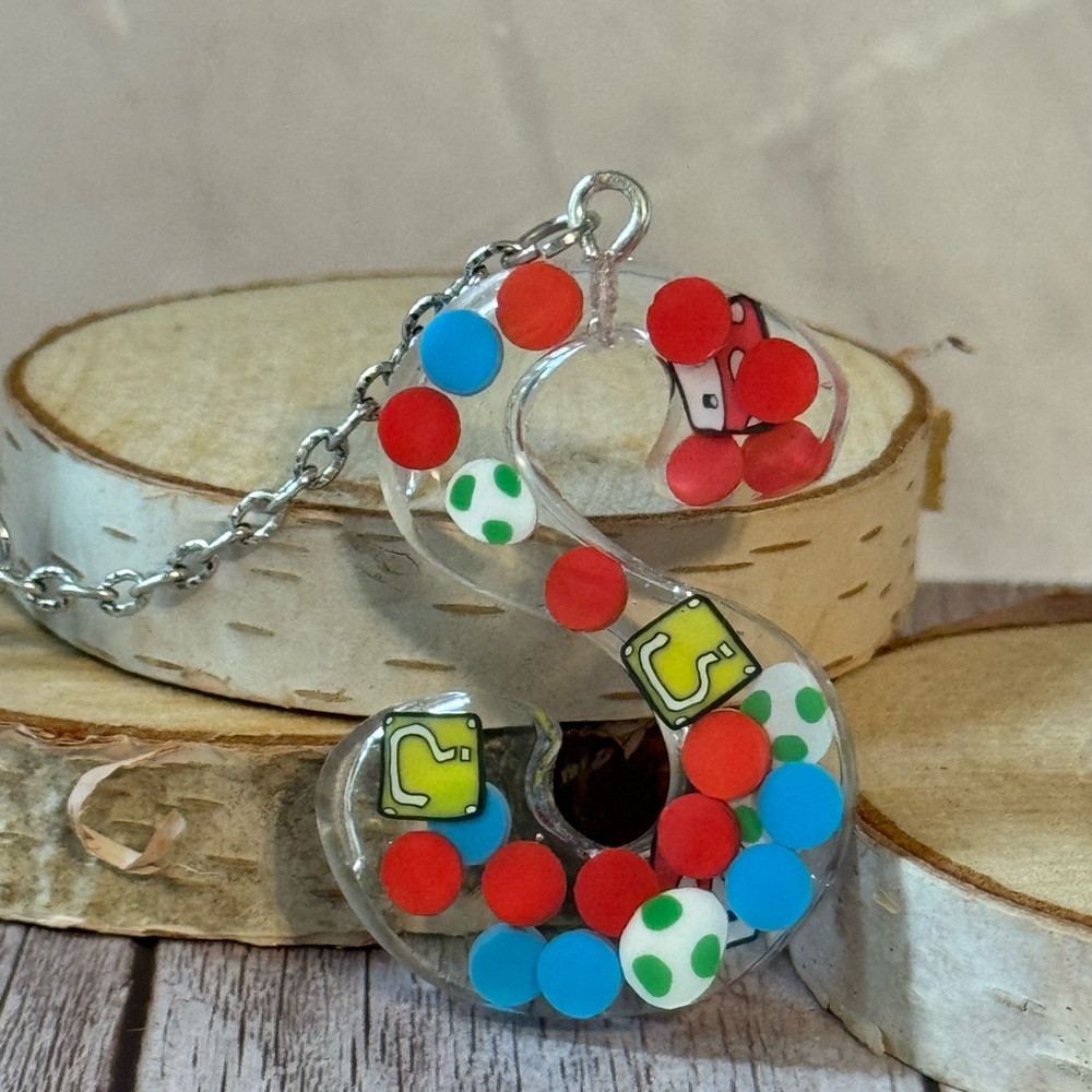 Letter S with video game inspired charms newly made.